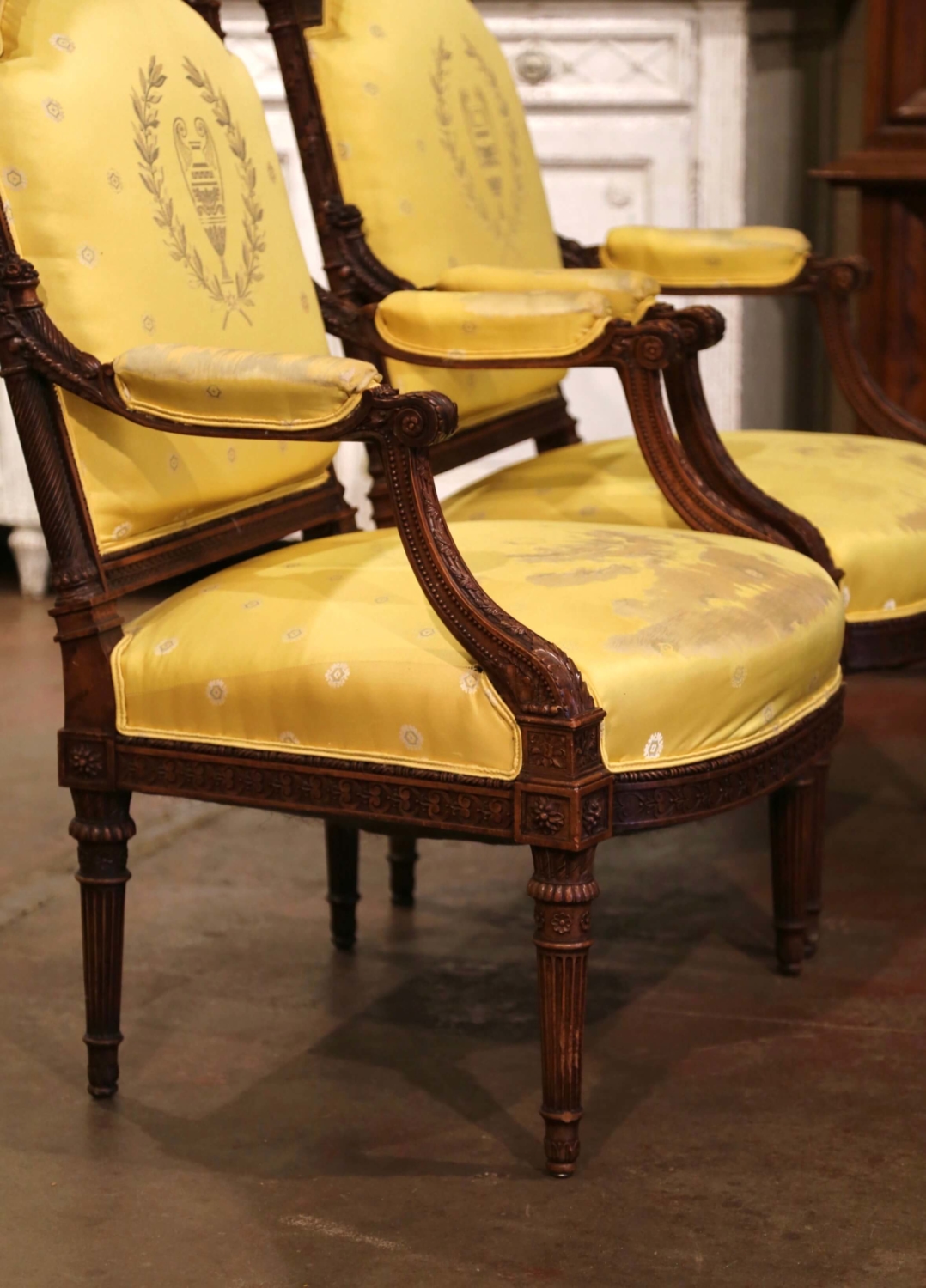 Pair of 19th C. French Louis XVI Style Walnut Fauteuils à la Reine