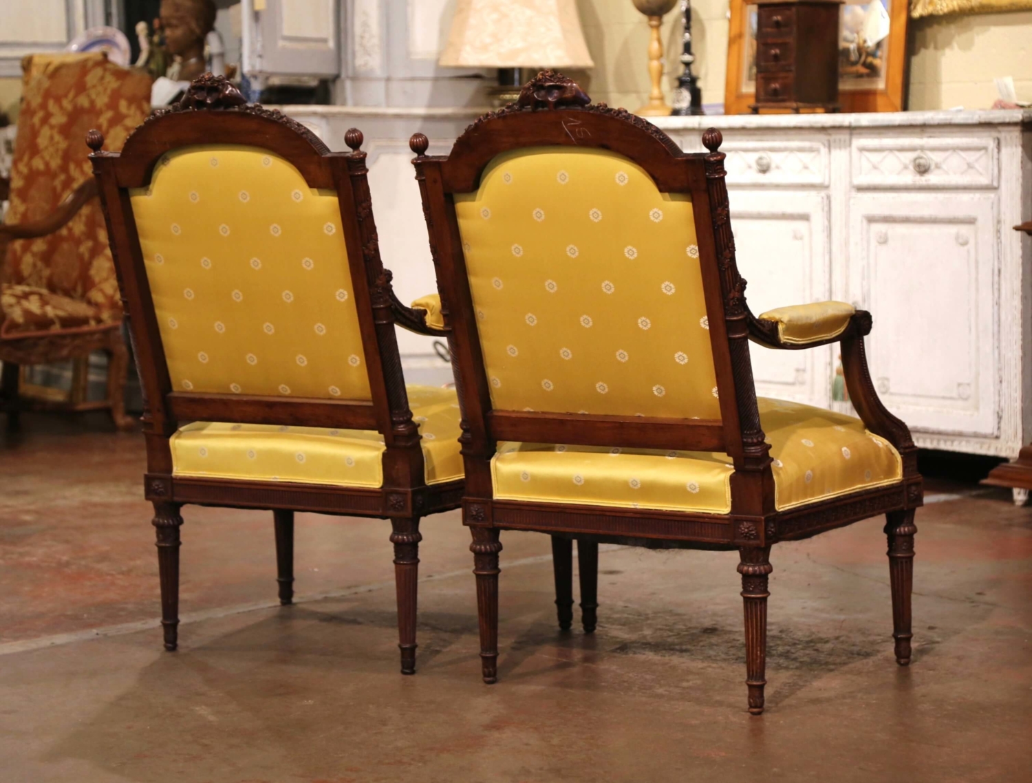 Pair of 19th C. French Louis XVI Style Walnut Fauteuils à la Reine