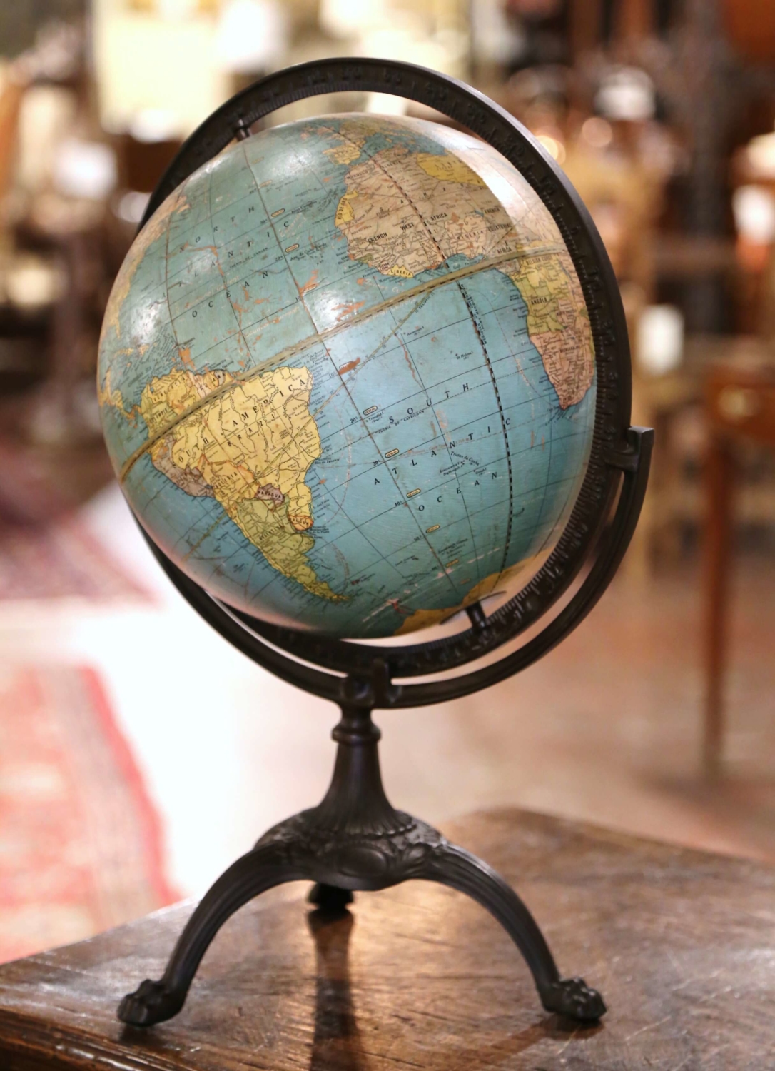 Antique World Globe on Cast Iron Stand