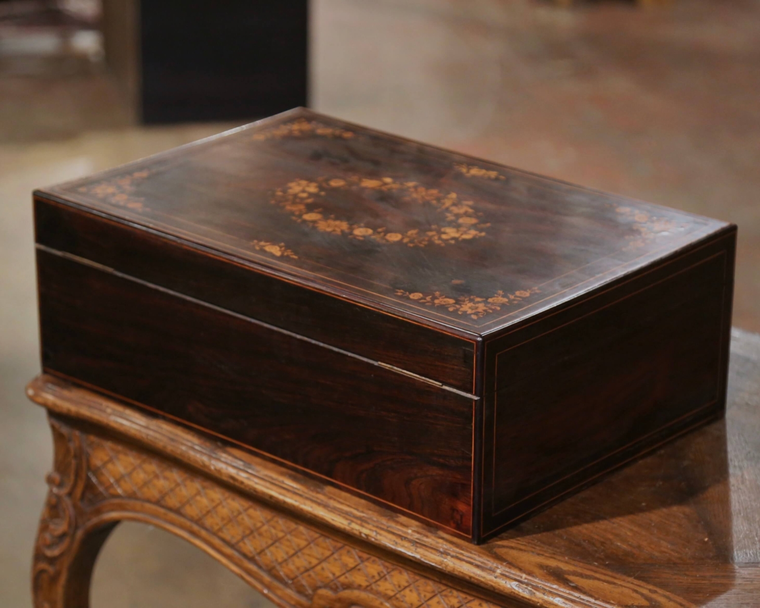 An antique rosewood sewing box with contents