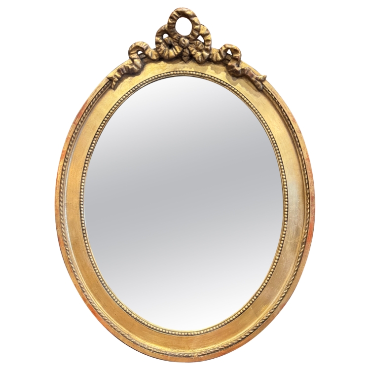 19th Century French Carved Giltwood Oval Wall Mirror with Louis XVI Ribbon Bow