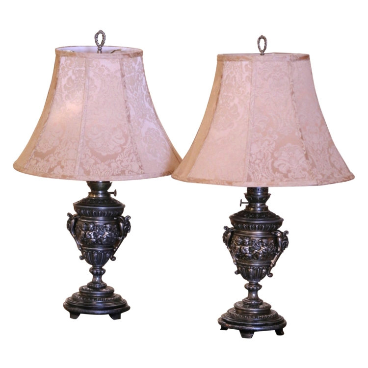 Pair of 19th Century French Polished Repousse Urn-Shaped Table Oil Lamps
